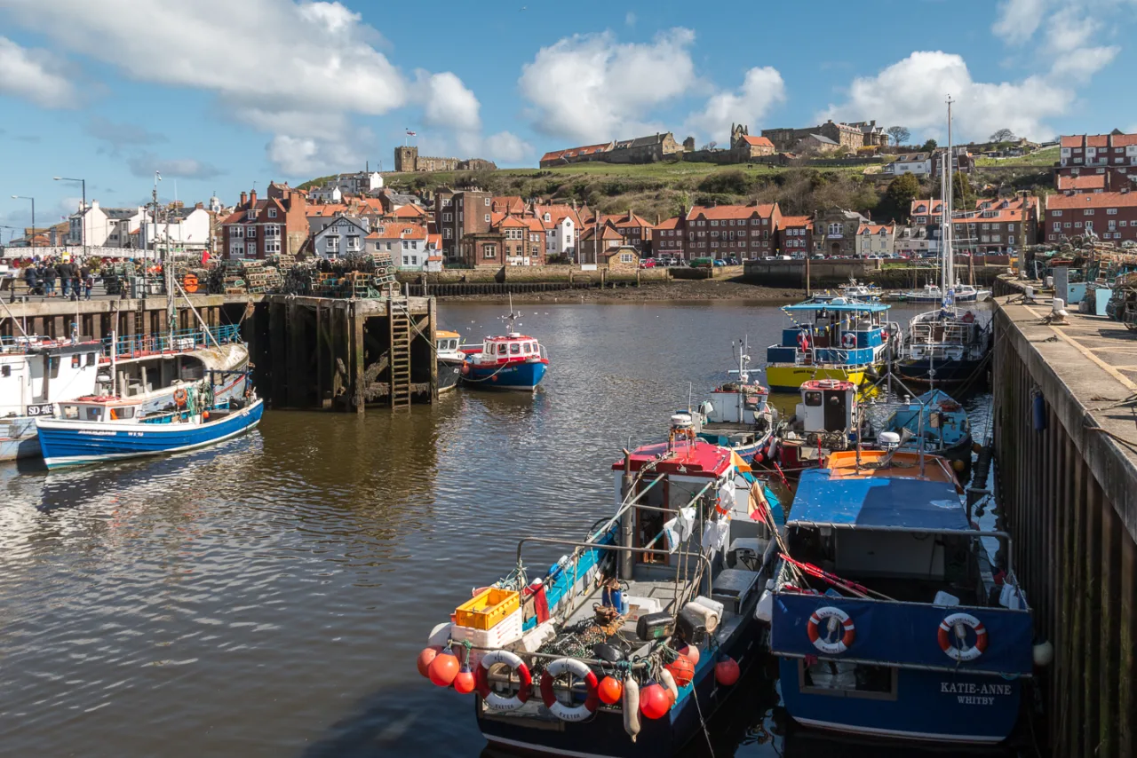Fishing boats and waterfront buildings at Whitby Harbour